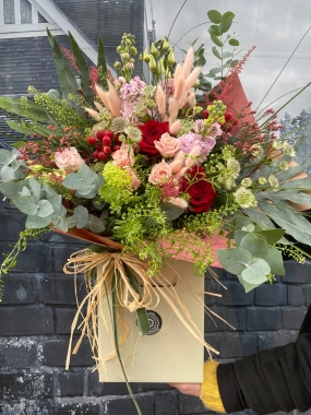 Red and Pink rose flower bouquet by Grand Flowers available for delivery