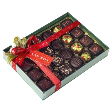 Deluxe vegan friendly chocolates in forest green rigid base